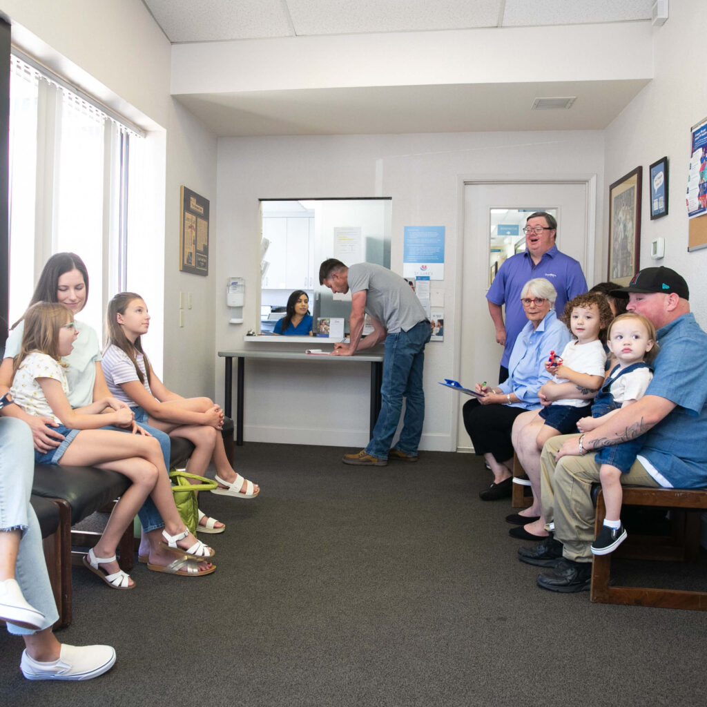 Waiting room with happy patients