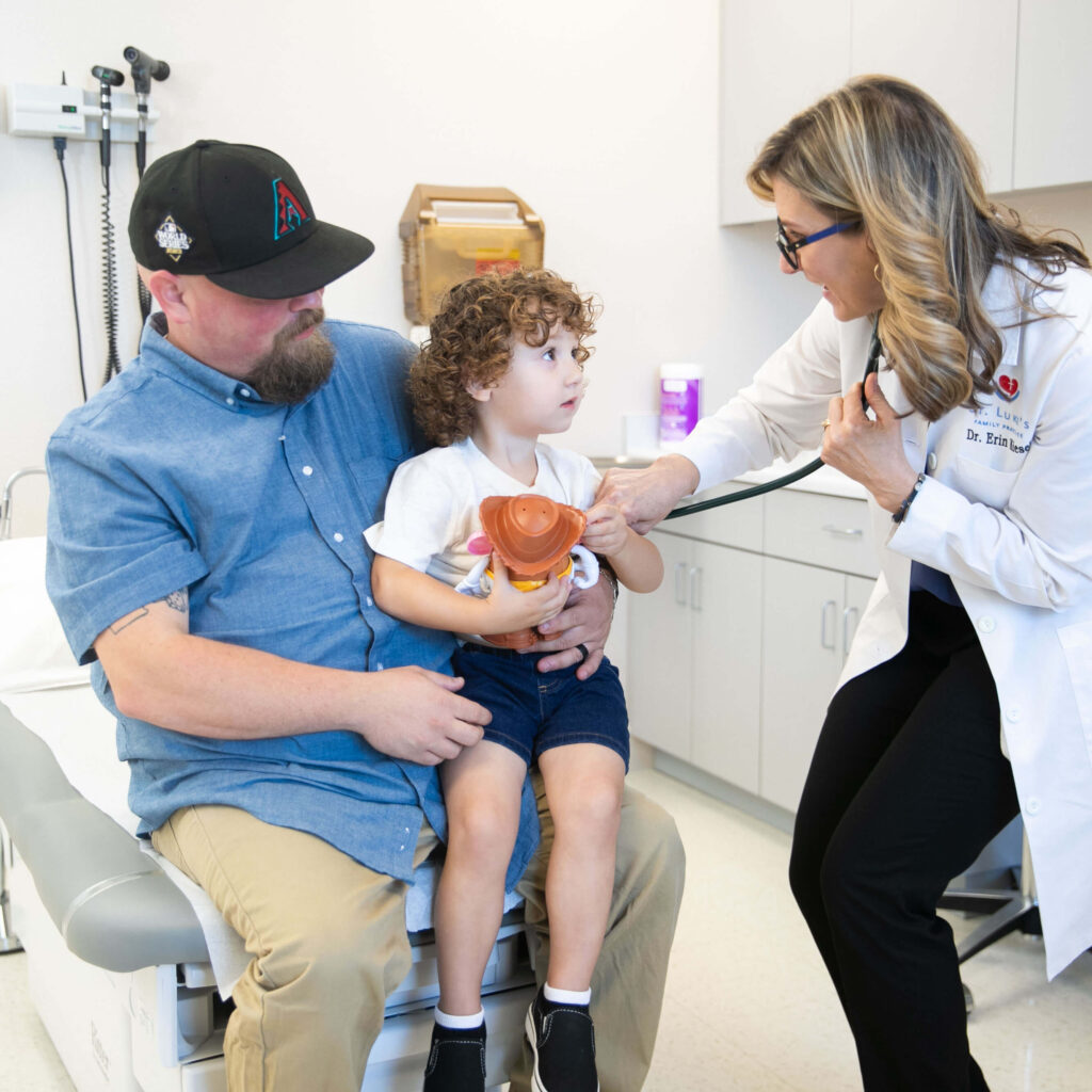 Patient and father with doctor